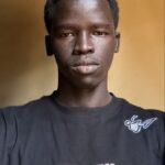 TOMAS  RIAM - Kampala, Ouganda